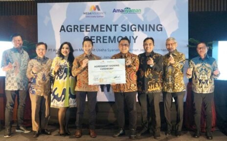 Mega Insurance Gandeng Amannyaman Perluas Asuransi Perjalanan Syariah